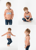 A four-panel studio photo of a young boy modeling a long-sleeve striped shirt. The shirt has horizontal peach and white stripes with a blue and yellow truck graphic on the chest.